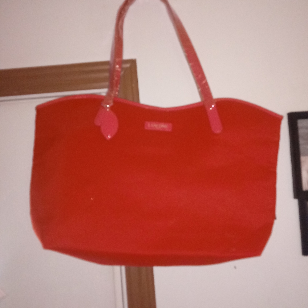 Large fushia pink hand bag never used